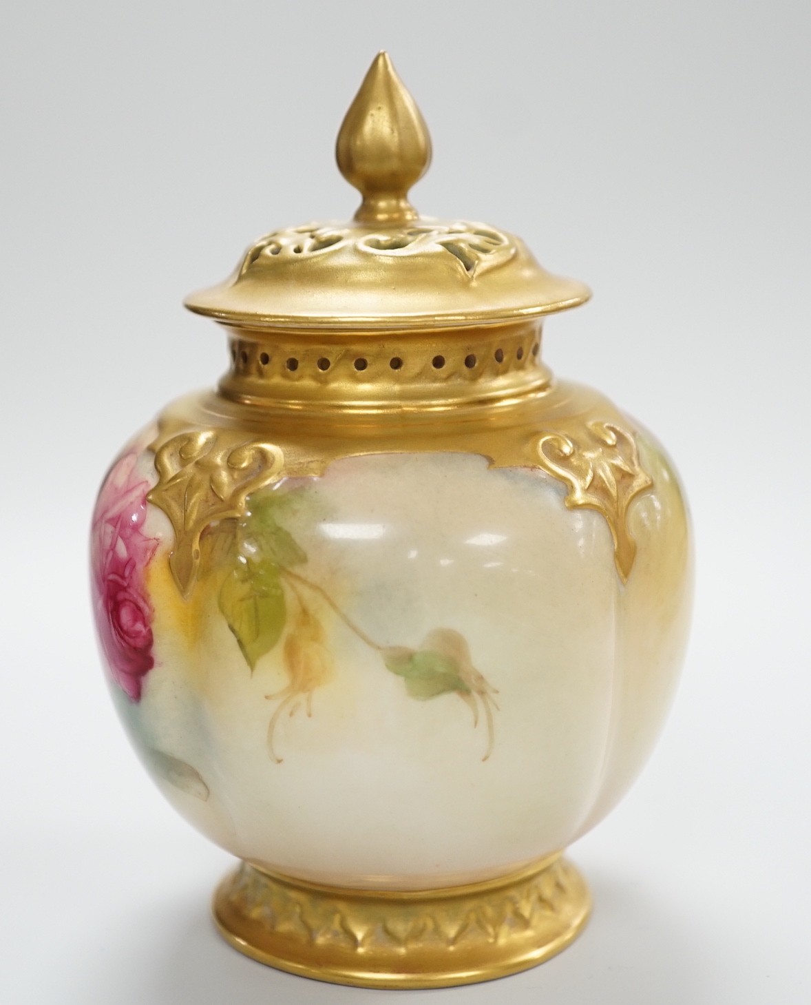 A Royal Worcester pink rose painted pot pourri vase and cover. 14cm tall